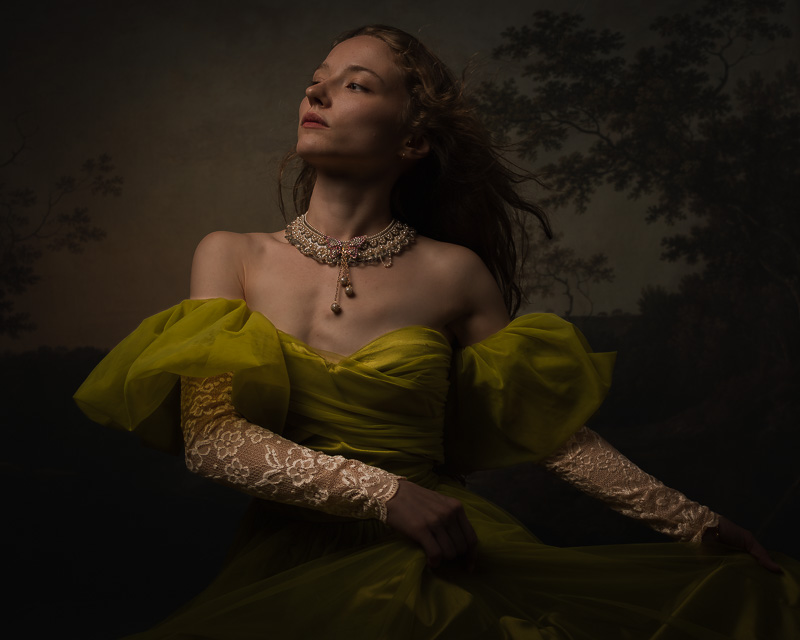 Portrait of a woman in a yellow-green gown and lace gloves.